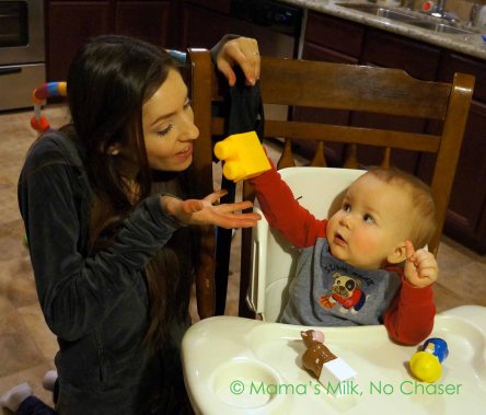 Not ready for solids yet? Toys will keep a younger baby happy when you're busy eating.